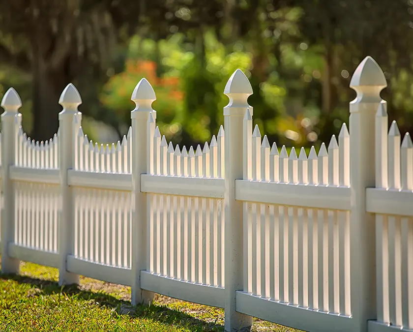 white vinyl picket fence